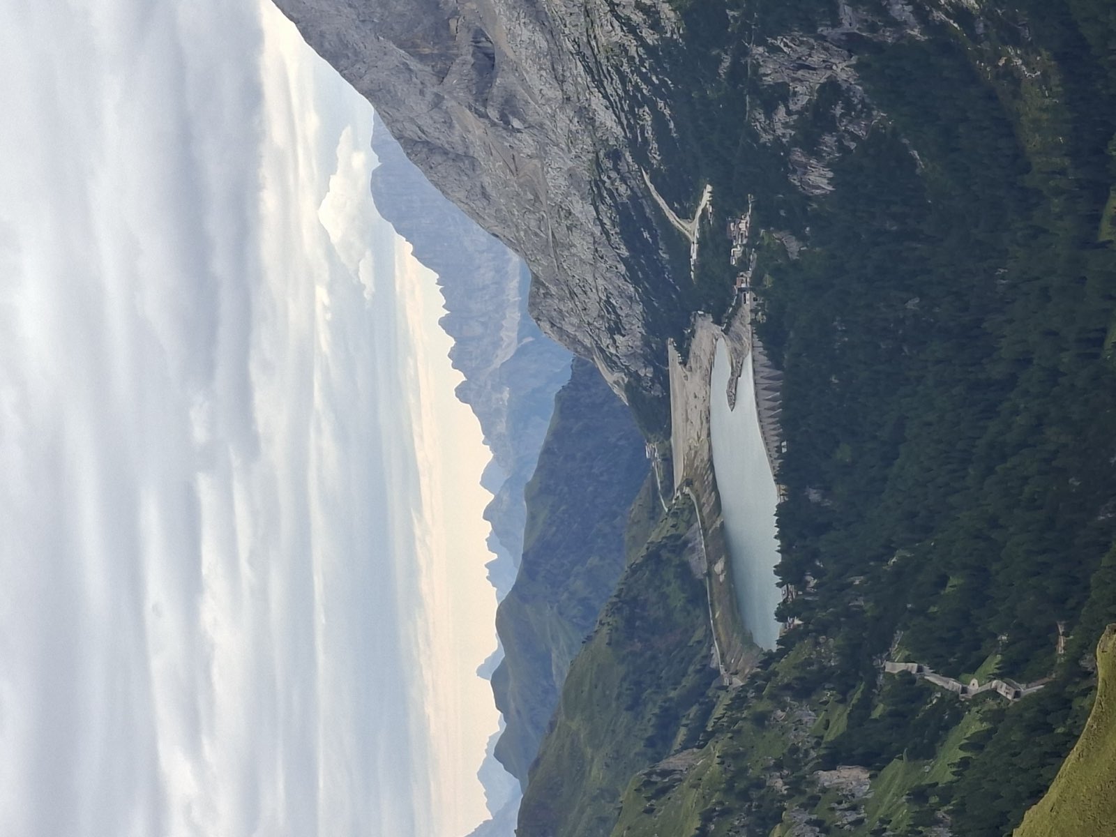 Il Lago Fedaia con la diga, sotto la parete della Marmolada